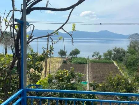 Detached House For Sale On 2000M2 Plot Of Land By The Sea In Marmaris Söğüt Neighborhood. Suitable For Tying A Boat In Front Of It.